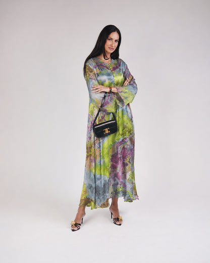 Full-length view of Mirelle dark purple and green modest dress with flowing A-line skirt