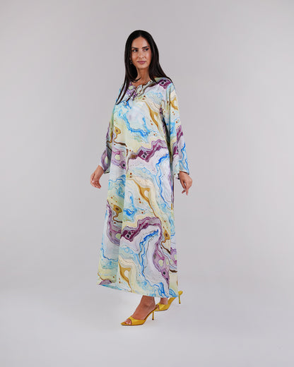 Full-length view of the Lagoon Azure silk dress and its relaxed modest silhouette.