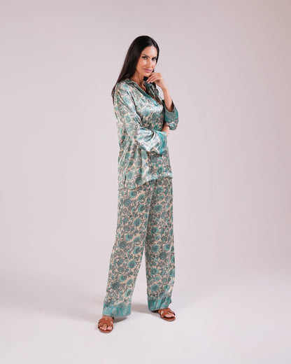 Full-length view of the Soleia Tiffany blue silk top and wide-leg trousers