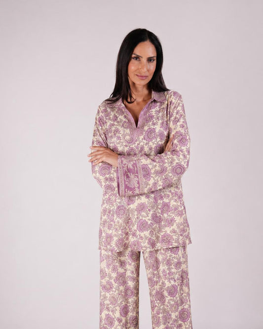 Model wearing the Soleia light purple and nude printed silk two-piece set