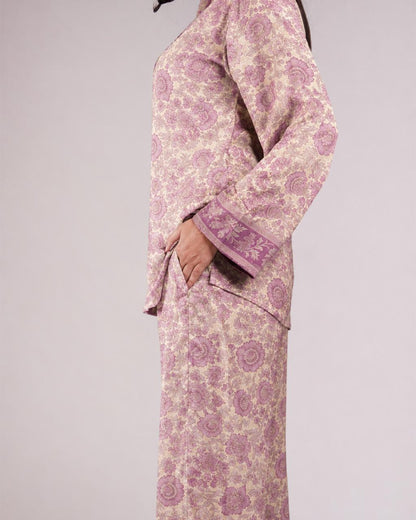 Detail of the Soleia light purple silk top showing its print and sleeve cuff